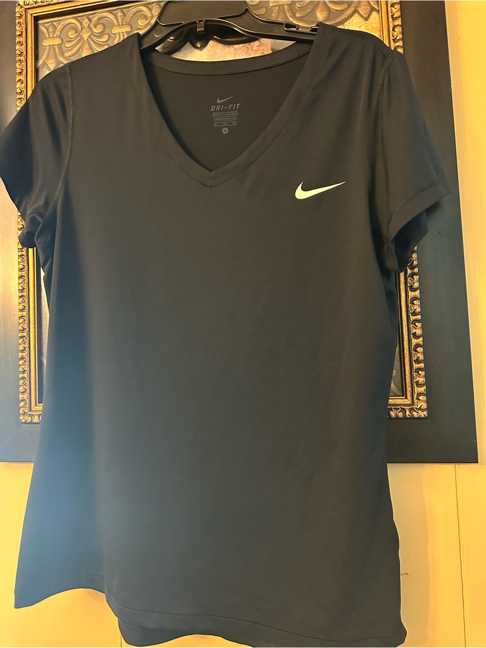 Nike Women’s Dri-FIT Short Sleeve V-Neck Tee in Black with White Swoosh